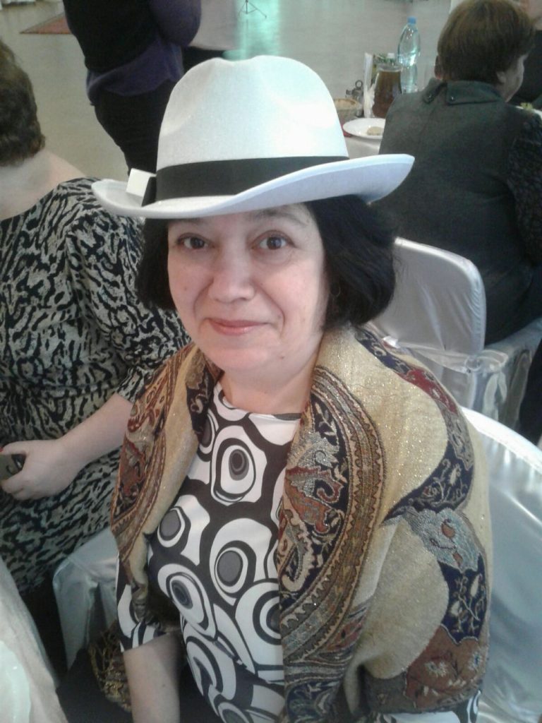 Liliya, case worker at the Kiev Hesed, smiles for the camera