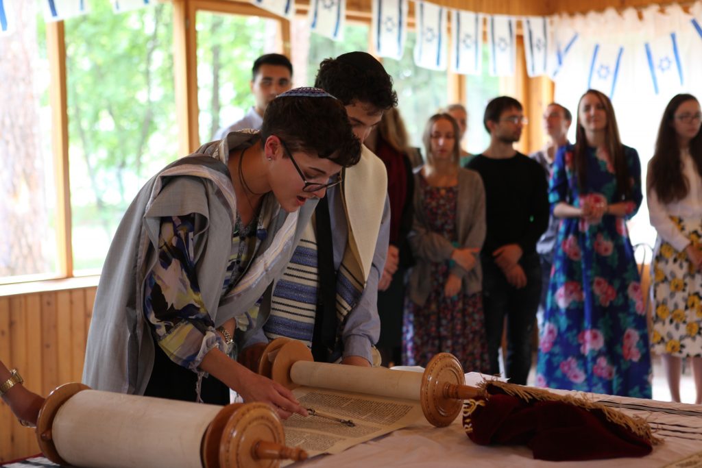 Rachel Simmons reads from the torah as a part of a communal b