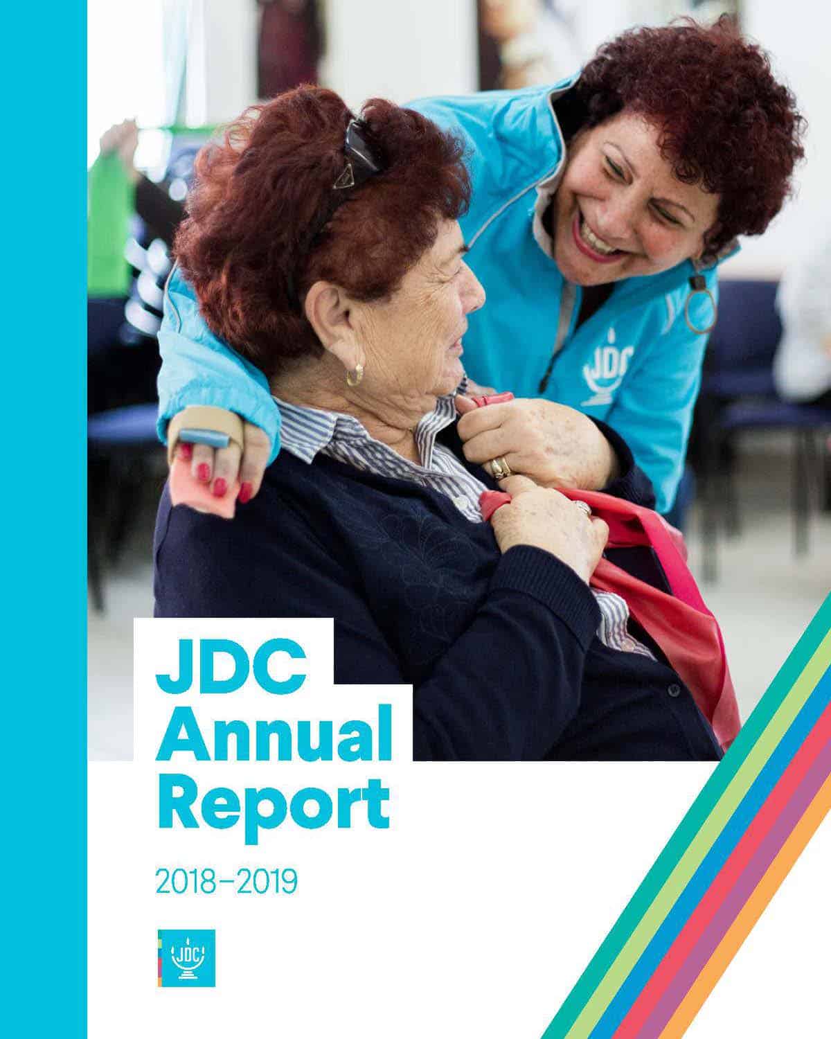 JDC's Annual Report 2019 in which a JDC volunteer in Israel embraces an elderly client and smiles.