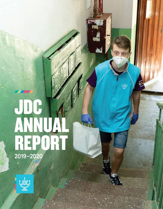 JDC's Annual Report 2020 in which a boy delivers mitzvah to an elderly person in Kishinev, Moldova.